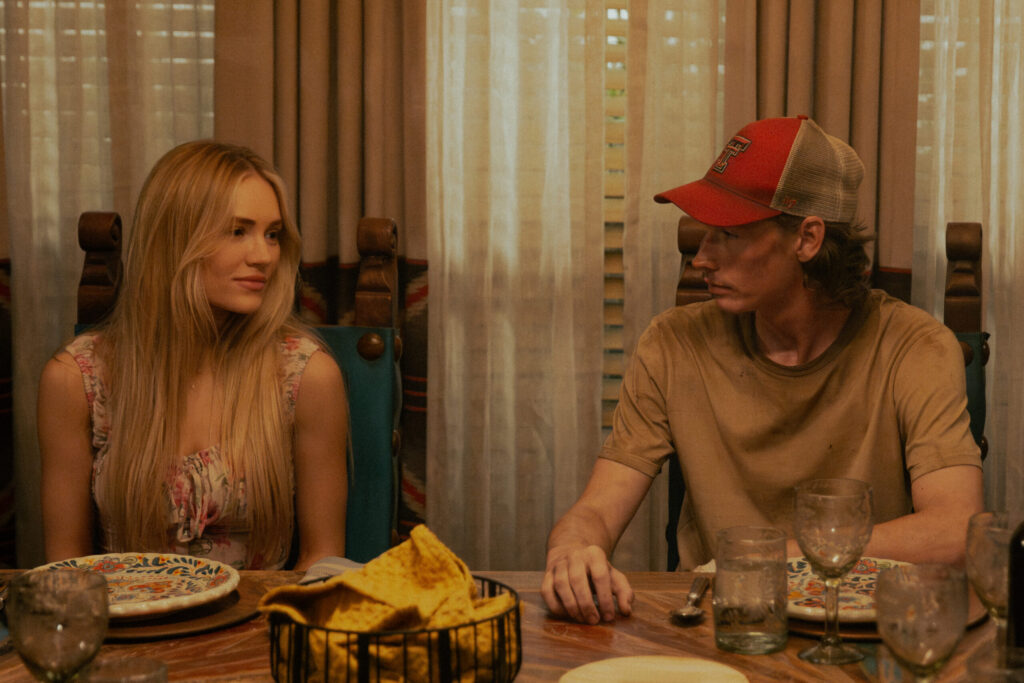Cooper Norris and Ainsley Norris at the dinner table, showing sibling dynamics and quiet tension in a Landman family scene.