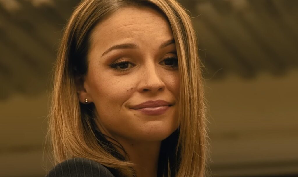 Rebecca Falcone flashes a knowing smirk in Landman, leaving fans guessing—is she M-Tex’s savior or its ultimate undoing?