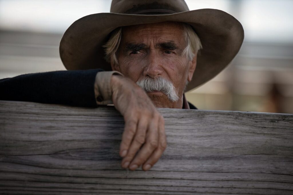 Sam Elliott as Shea Brennan in 1883, a Western role fans hope will inspire his mysterious character in Landman Season 2.