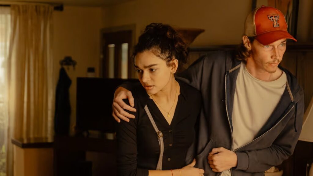 Cooper and Ainsley share an intense moment in Landman Season 1, navigating danger, loyalty, and tough choices in West Texas.